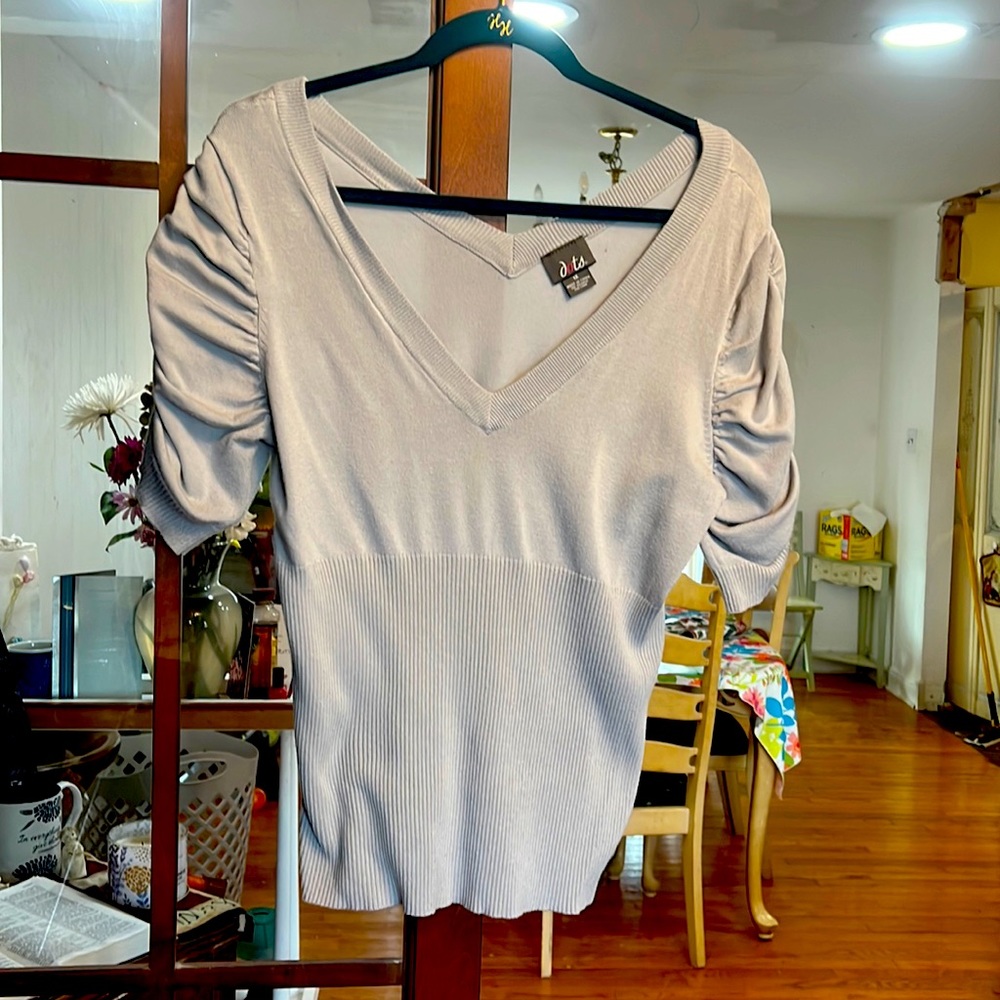 Junior size 1x ruffled sleeves blouse.